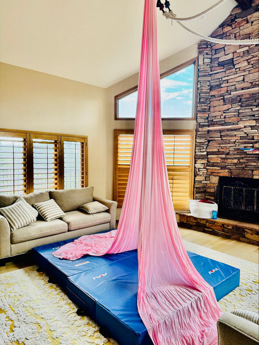 aerial silks hanging from home ceiling